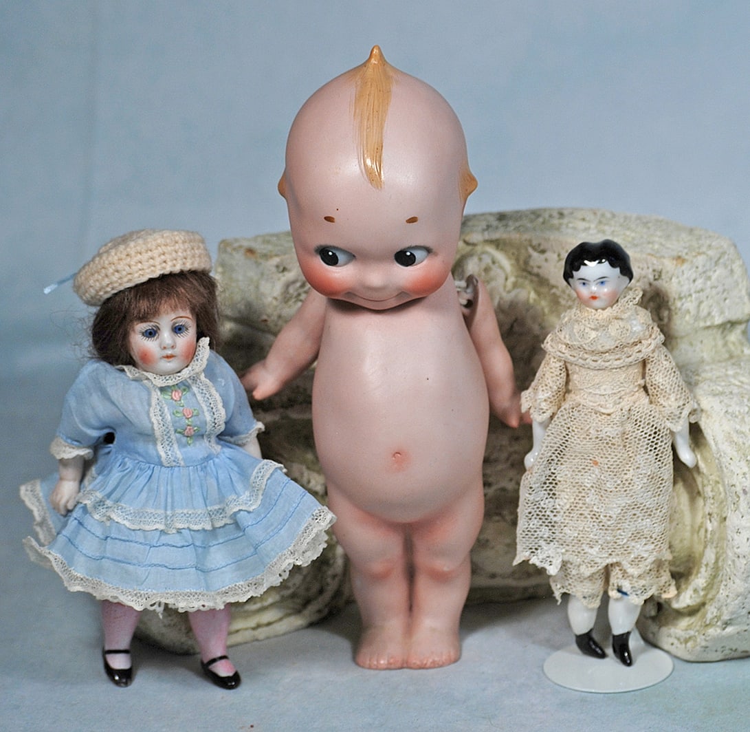 ALL-BISQUE DOLL, PORCELAIN DOLL HOUSE DOLL, AND KEWPIE (1 of 1)