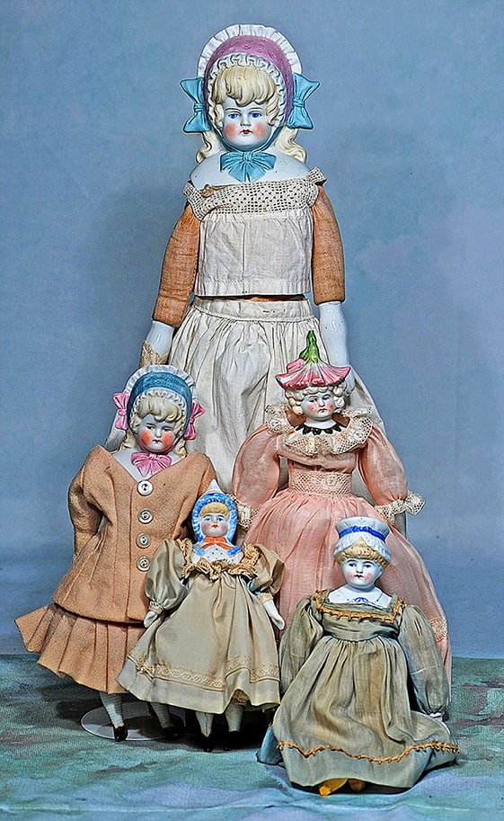 FIVE GERMAN BISQUE DOLLS WITH SCULPTED BONNET (1 of 1)