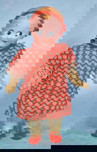 GERMAN BISQUE GOOLGY-EYED DOLL BY GOEBEL WITH RED HAIR BAND: 2. GERMAN BISQUE GOOLGY-EYED DOLL BY GOEBEL WITH RED HAIR BAND. Marks: P. Goebel symbol 12. Germany.7”. Bisque socket head, sculpted blonde hair with forelock curl, painted red hair band and