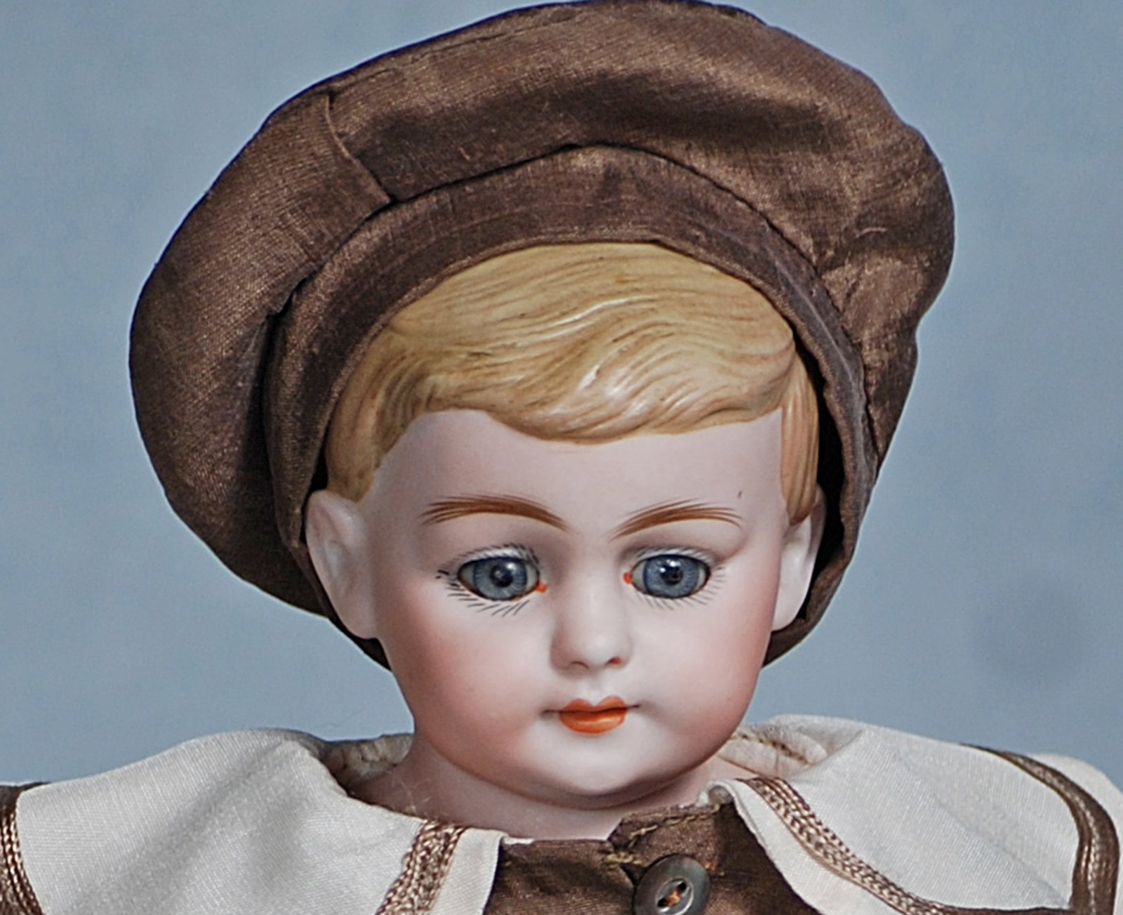 GERMAN BISQUE DOLL KNOWN AS “AMERICAN SCHOOL BOY”. (1 of 2)