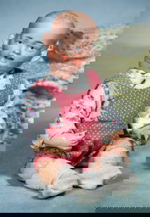 GERMAN BISQUE DOUBLE-FACE CHARACTER BABY: 14. GERMAN BISQUE DOUBLE-FACE CHARACTER BABY. 10”. Marks: None. Solid dome bisque socket head with double face representing smiling child and frowning child. Painted features, blue eyes,