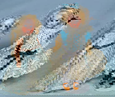 TWO MINIATURE GERMAN BISQUE DOLLS.: 19. TWO MINIATURE GERMAN BISQUE DOLLS. 4 ½” doll marked “K * R”, socket head, blue sleep eyes, open mouth, upper teeth, original blonde mohair wig, five-piece jointed