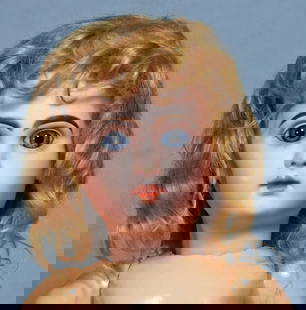 FRENCH BISQUE BEBE BY JUMEAU.: 22. FRENCH BISQUE BEBE BY JUMEAU. 19”. Marks: Depose Tete Jumeau Bte SGDG 8. Bisque socket head, blue paperweight eyes, painted lashes, eyeliner, feathered and arched brows, pierced ears,