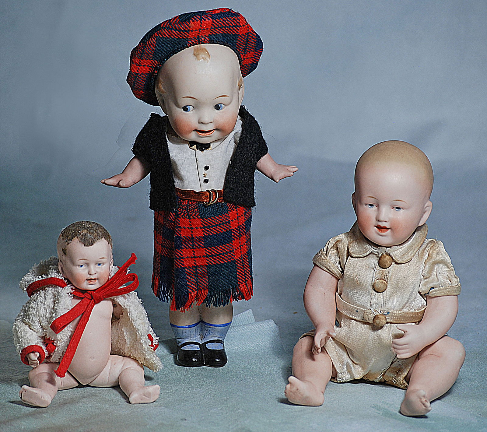 THREE GERMAN ALL-BISQUE DOLLS. (1 of 1)