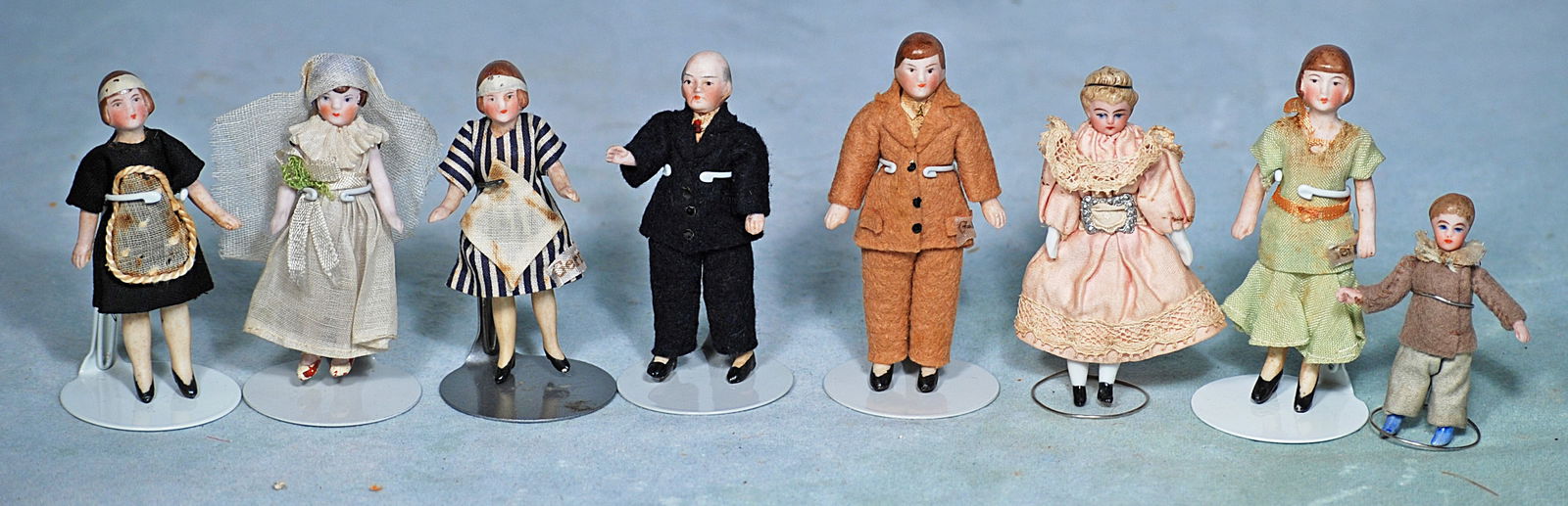 EIGHT MINIATURE GERMAN BISQUE DOLL HOUSE DOLLS. (1 of 1)
