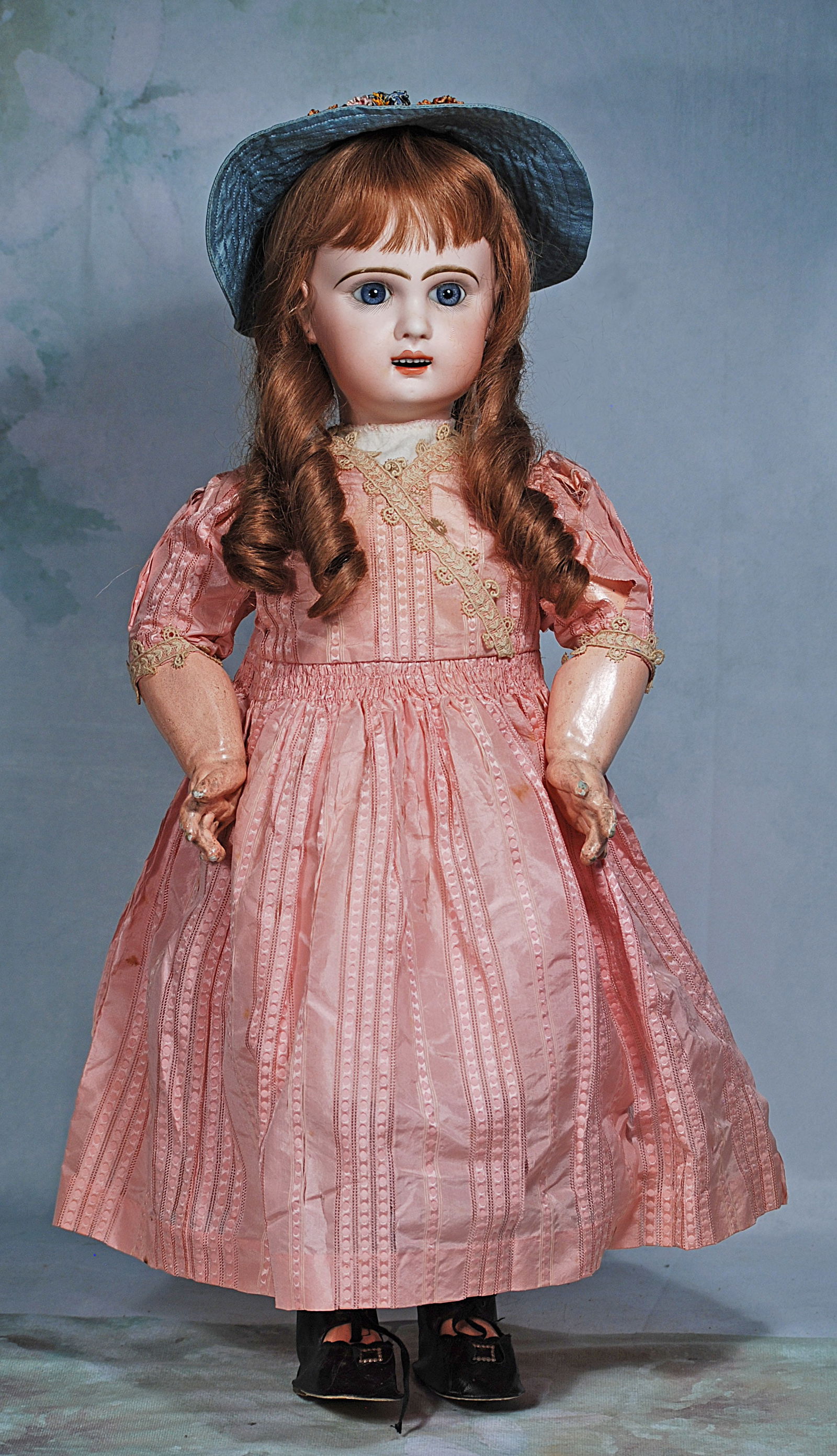 FRENCH BISQUE BEBE JUMEAU WITH MAMA/PAPA PULL STRINGS.: 96. FRENCH BISQUE BEBE JUMEAU WITH MAMA/PAPA PULL STRINGS. Marks: 11. 24”. Bisque socket head, blue paperweight eyes, painted lashes, feathered brows, pierced ears, open mouth, upper teeth, aubu