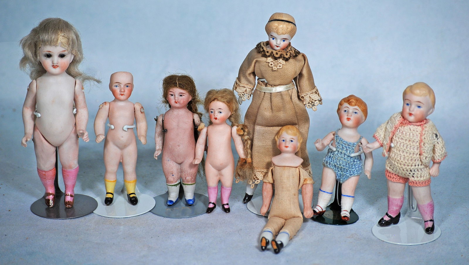 TEN TINY GERMAN BISQUE DOLLS. (1 of 1)