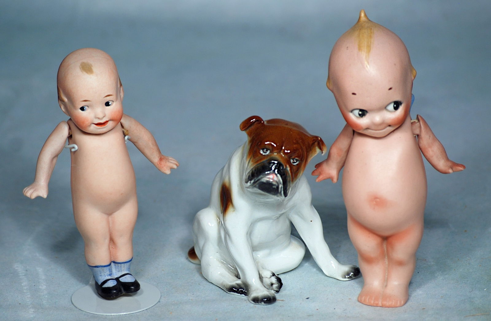 GERMAN BISQUE KEWPIE, WIDE-A-WAKE DOLL, AND PORCELAIN BULL DOG. (1 of 1)