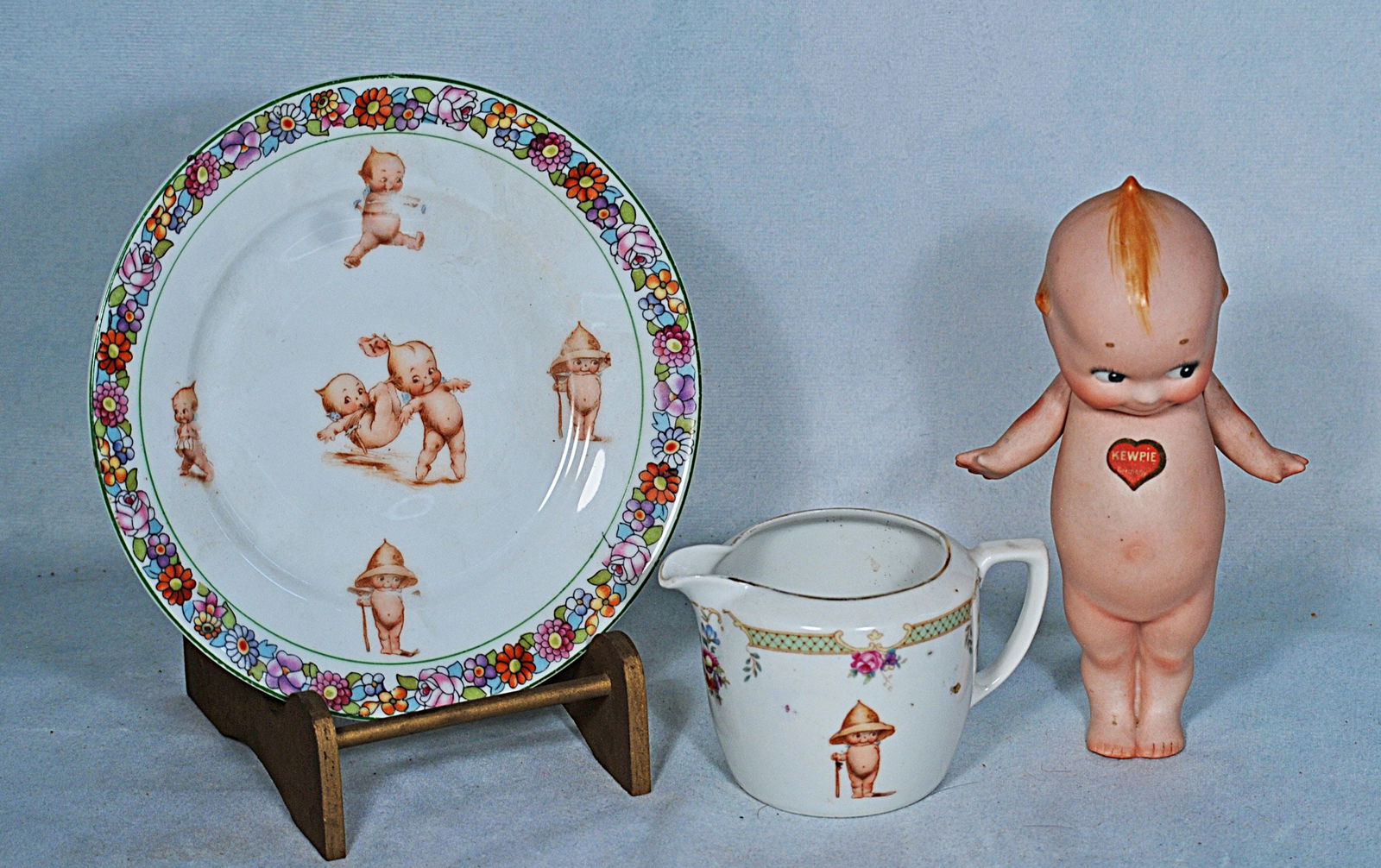 GERMAN BISQUE KEWPIE DOLL AND KEWPIE DISHES (1 of 1)