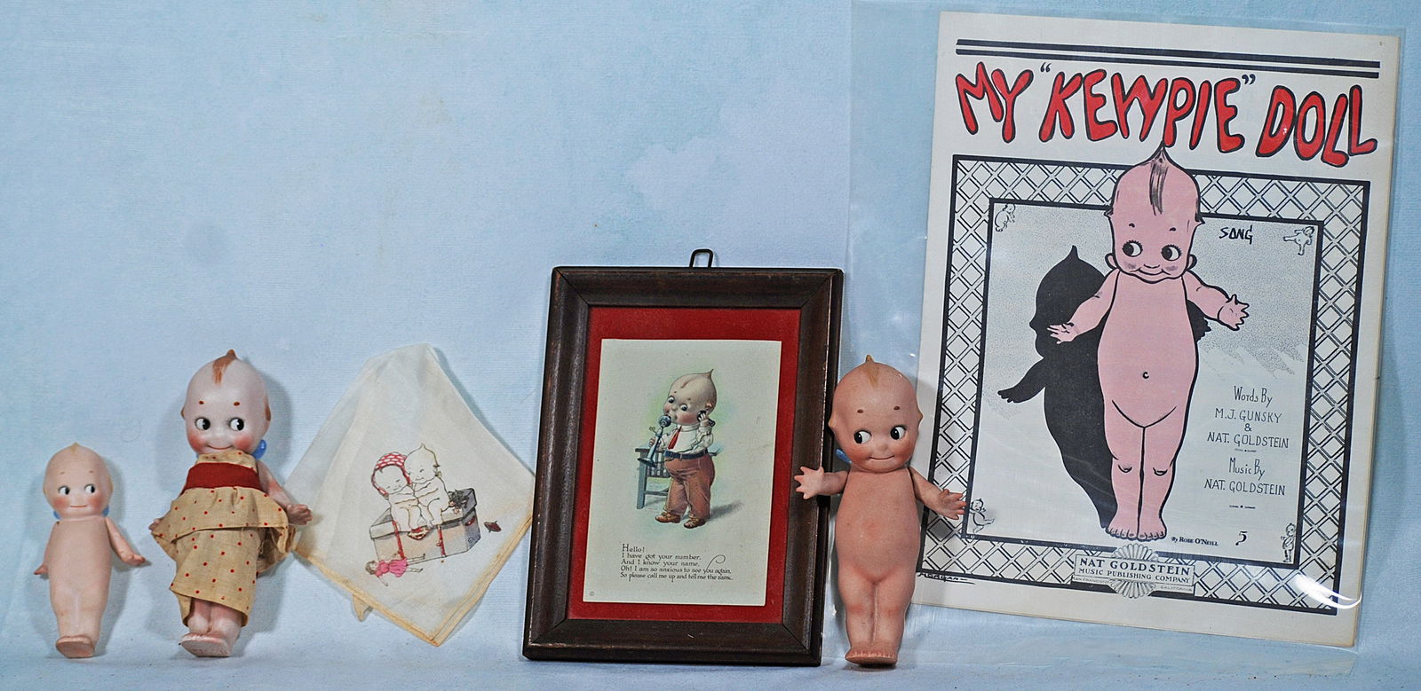 GEGERMAN BISQUE KEWPIE DOLLS, KEWPIE PHOTO, HANDKERCHIEF, AND SHEET MUSIC. (1 of 1)