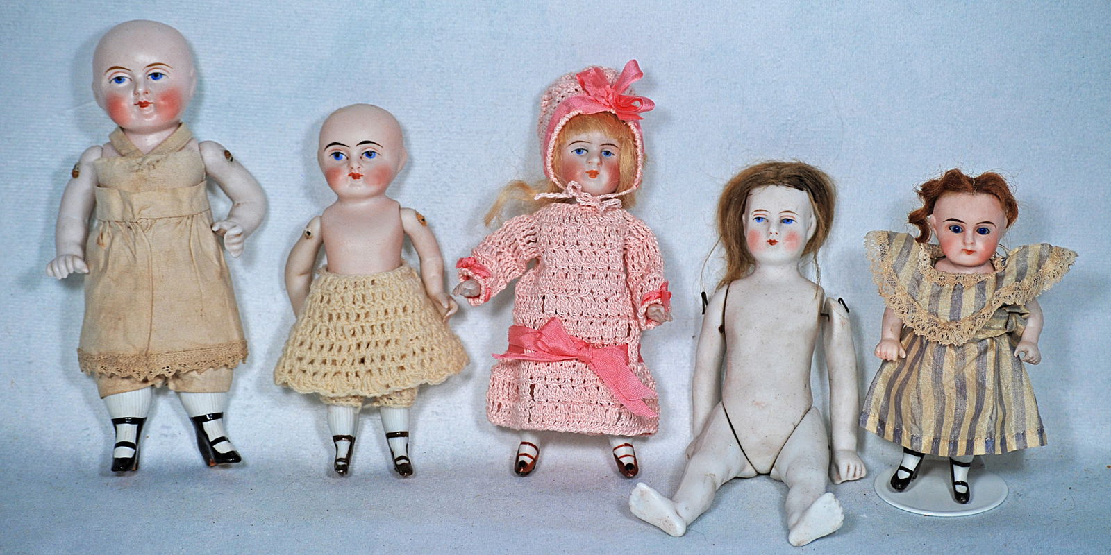 FIVE GERMAN ALL-BISQUE DOLLS (1 of 1)