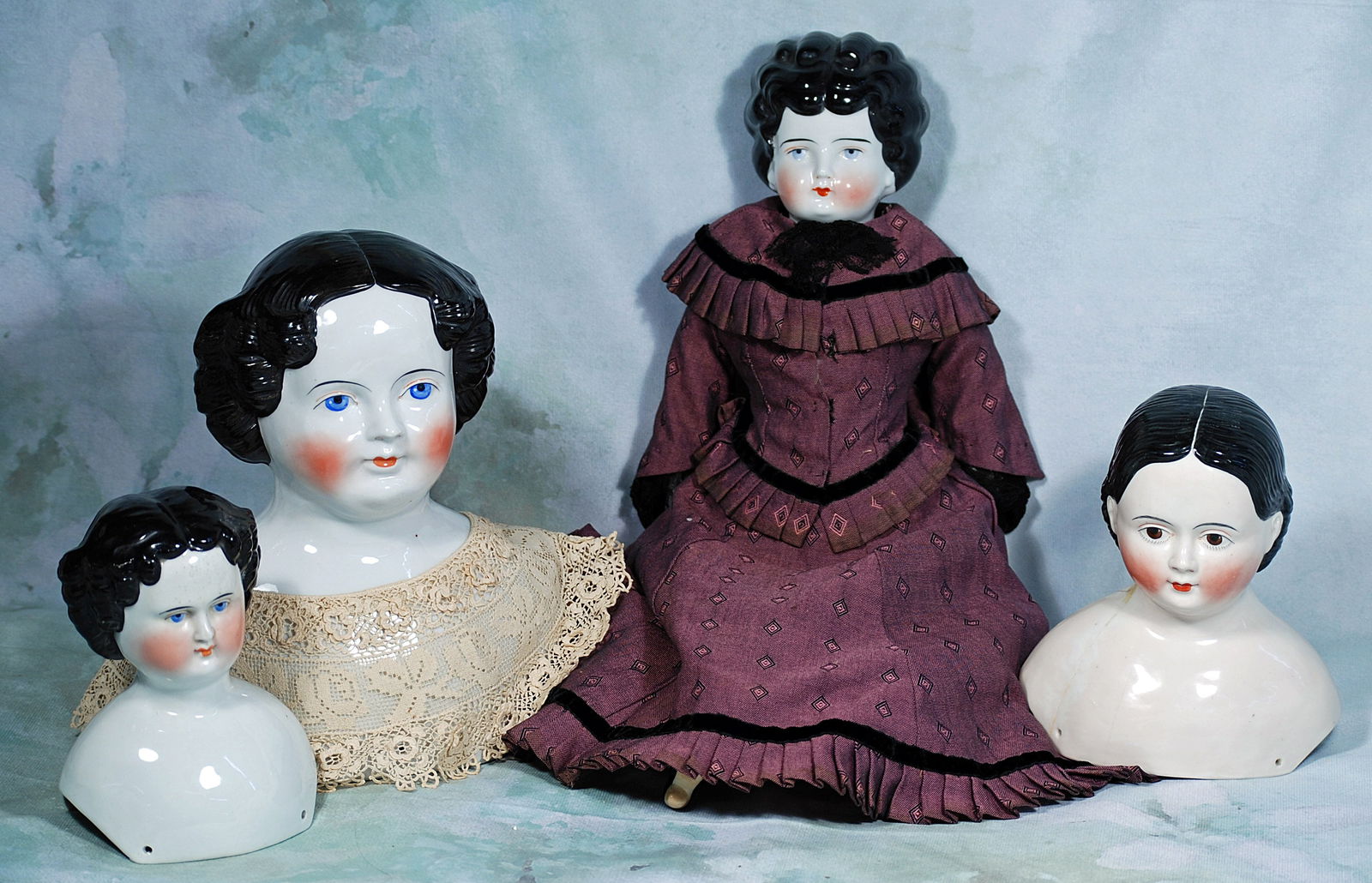 THREE CHINA HEADS AND ONE CHINA DOLL. (1 of 1)
