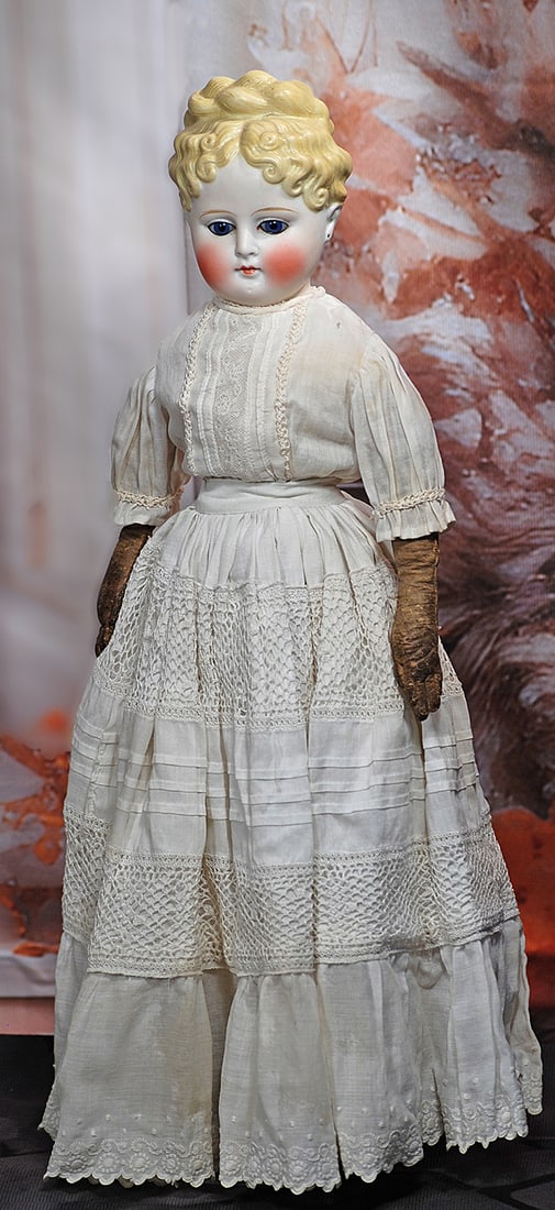 GERMAN BISQUE LADY WITH SCULPTED HAIR AND GLASS EYES. (1 of 2)