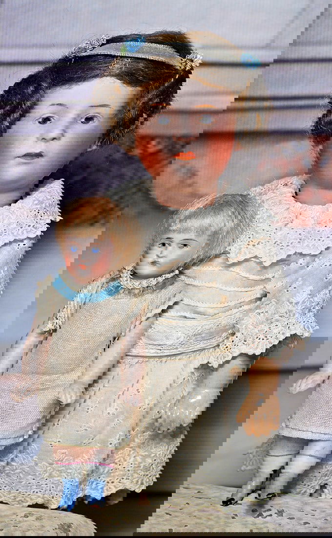 PETITE GERMAN BISQUE POUTY CHILD, 6969, BY GEBRUDER HEUBACH WITH ALL-BISQUE DOLL.  9î.  Marks: (1 of 1)