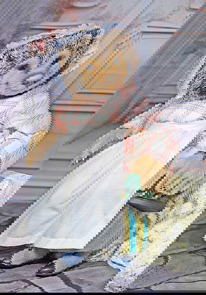 ARTIST PROOF ;MRS. TIGGY-WINKLE; BY R. JOHN WRIGHT.: ARTIST PROOF MRS. TIGGY-WINKLE BY R. JOHN WRIGHT. 12". Mohair plush hedgehog, fully-jointed with molded features, glass eyes, whiskers, resin claws, dressed in cotton costume, leather and felt boots,