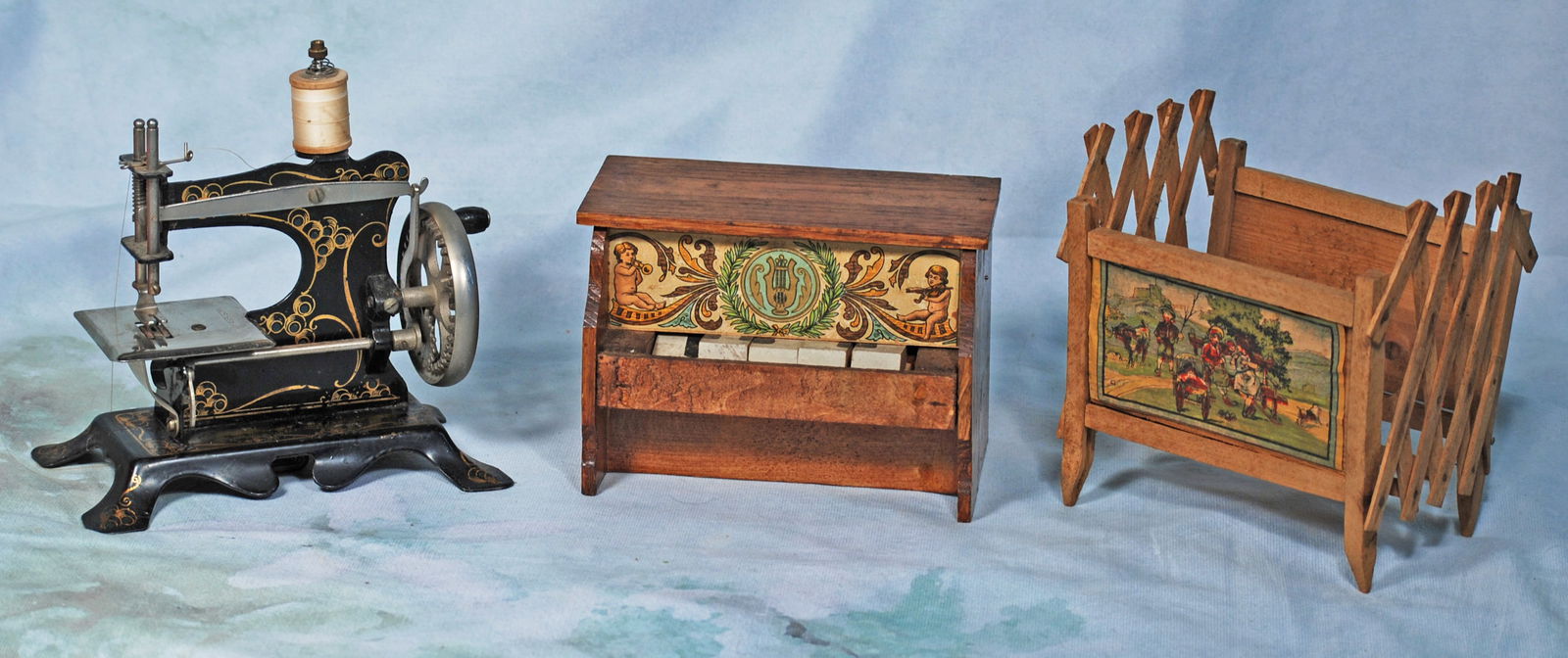 GERMAN TIN TOY SEWING MACHINE,  EXPANSION CRADLE AND MINIATURE PIANO. (1 of 1)