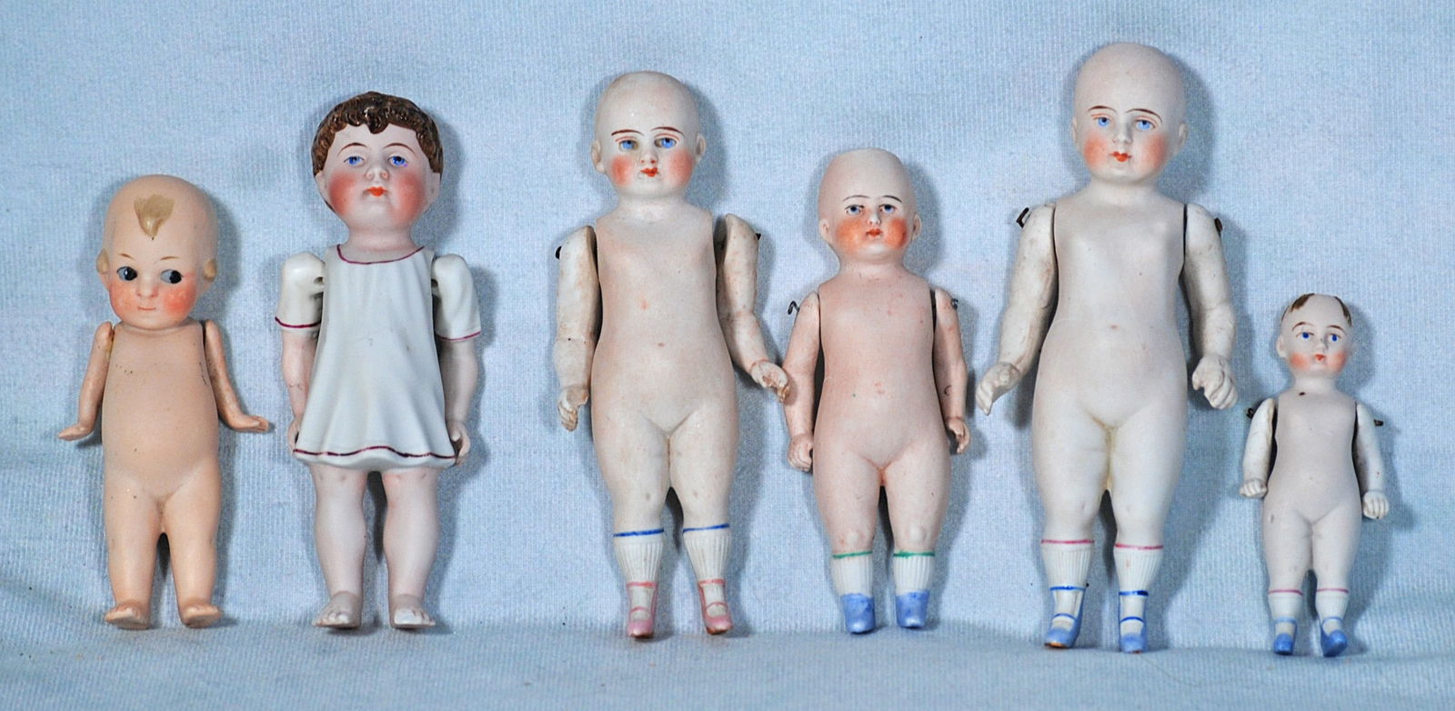 SIX GERMAN ALL-BISQUE DOLLS (1 of 1)