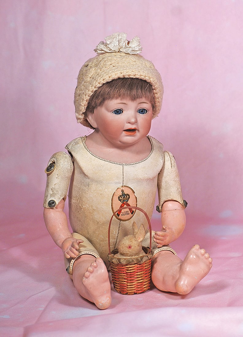 KESTNER CHARACTER, MODEL 235, WITH UNIQUE BODY. 14”. Marks: J.D.K. 235. Bisque: KESTNER CHARACTER, MODEL 235, WITH UNIQUE BODY. 14”. Marks: J.D.K. 235. Bisque shoulderhead, blue sleep eyes, painted lashes, feathered brows, open mouth, accented lips, two lower teeth, brunett