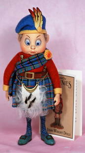 R. JOHN WRIGHT “THE SCOTCHMAN” BROWNIE. 9”. All-felt doll, jointed at neck and: R. JOHN WRIGHT “THE SCOTCHMAN” BROWNIE. 9”. All-felt doll, jointed at neck and shoulders, molded felt character face with hand-painted features, large blue googly eyes, wearing a tra