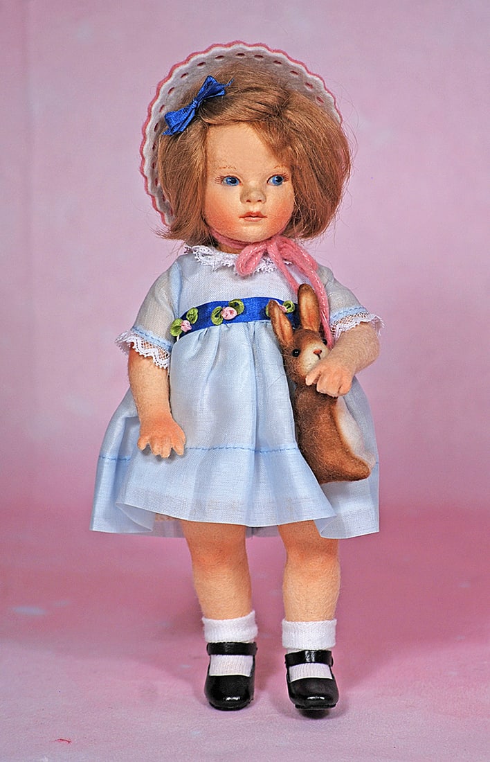 R. JOHN WRIGHT THE FOUR SEASONS “SPRING”. 7 ½”. All-felt, fully jointed,: R. JOHN WRIGHT THE FOUR SEASONS “SPRING”. 7 ½”. All-felt, fully jointed, hand painted features, mohair wig, wears blue organdy party dress, felt bonnet, and hand-cobbled leather