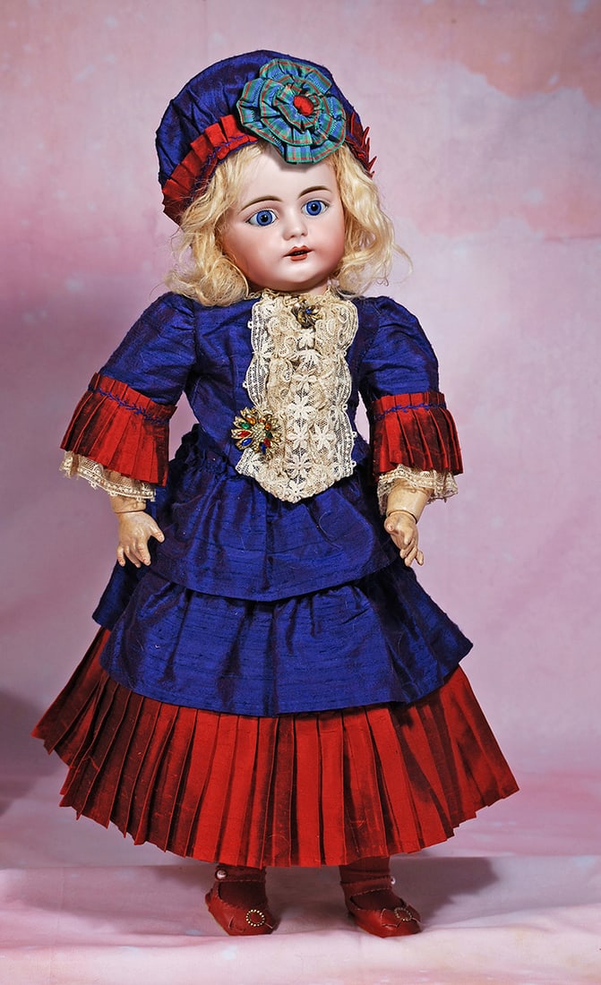 RARE GERMAN BISQUE CHILD, 719, BY SIMON AND HALBIG. 24”. Marks: S 12 H 719 Dep. Bisque: RARE GERMAN BISQUE CHILD, 719, BY SIMON AND HALBIG. 24”. Marks: S 12 H 719 Dep. Bisque socket head, stationary blue glass eyes, painted lashes, eyeliner, feathered brows, open mouth, accented li