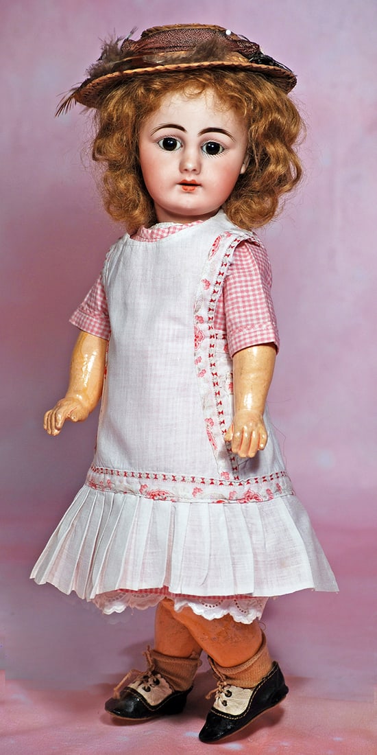 GERMAN BISQUE DOLL, 939, BY SIMON AND HALBIG. 14 ½”. Marks: S 7 H 939. Bisque socket: GERMAN BISQUE DOLL, 939, BY SIMON AND HALBIG. 14 ½”. Marks: S 7 H 939. Bisque socket head, stationary brown glass eyes, painted lashes, feathered and arched brows, pierced ears, open mouth,