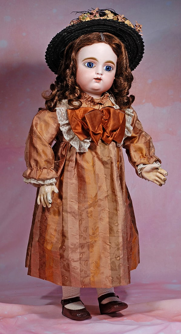 FRENCH BISQUE BEBE WITH UNUSUAL MOUTH MODELING BY GAULTHIER. 28”. Marks: 11 / F.G. in: FRENCH BISQUE BEBE WITH UNUSUAL MOUTH MODELING BY GAULTHIER. 28”. Marks: 11 / F.G. in scroll. Bisque socket head with plump rounded face and large blue paperweight eyes, painted lashes, eyeliner