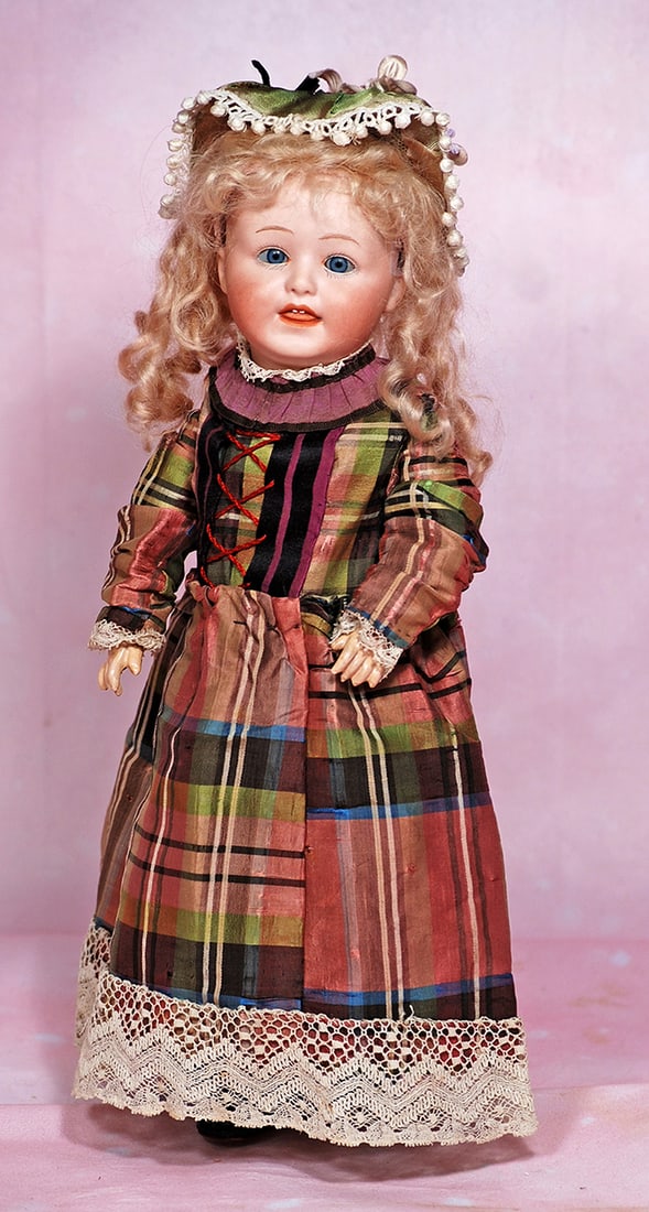 PETITE GERMAN BISQUE CHARACTER WITH STUCK-OUT TONGUE BY GEBRUDER HEUBACH. 12”. Marks: 8413: PETITE GERMAN BISQUE CHARACTER WITH STUCK-OUT TONGUE BY GEBRUDER HEUBACH. 12”. Marks: 8413 and Heubach in square. Bisque socket head, blue glass sleep eyes, painted lashes, feathered brows, open