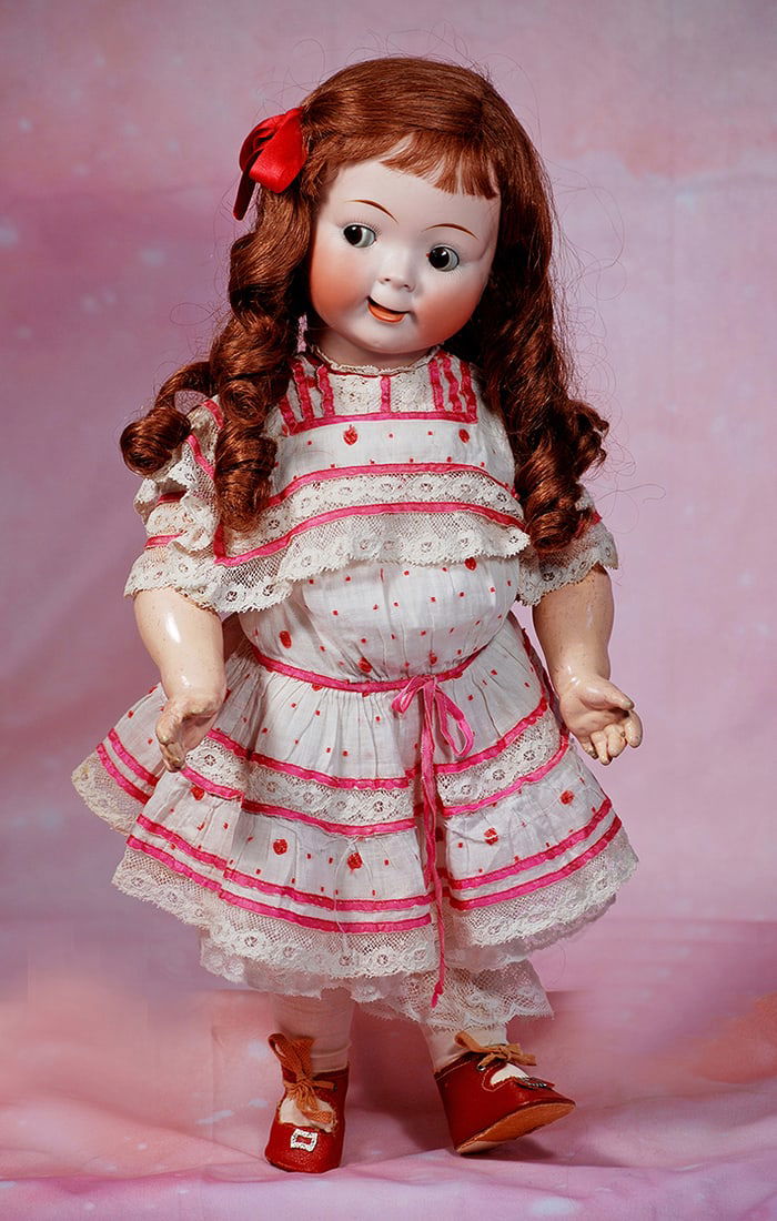 LARGE GERMAN BISQUE “JUBILEE GOOGLY” BY HERTEL AND SCHWAB.  Marks: 165.  19”. (1 of 2)