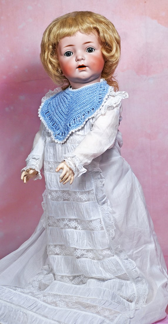 GERMAN BISQUE CHARACTER, 121, WITH TODDLER BODY BY KAMMER AND REINHARDT. 22”. Marks: K * R,: GERMAN BISQUE CHARACTER, 121, WITH TODDLER BODY BY KAMMER AND REINHARDT. 22”. Marks: K * R, Simon & Halbig 121. Bisque socket head, blue sleep eyes, painted lashes, eyeliner, feathered brows, di