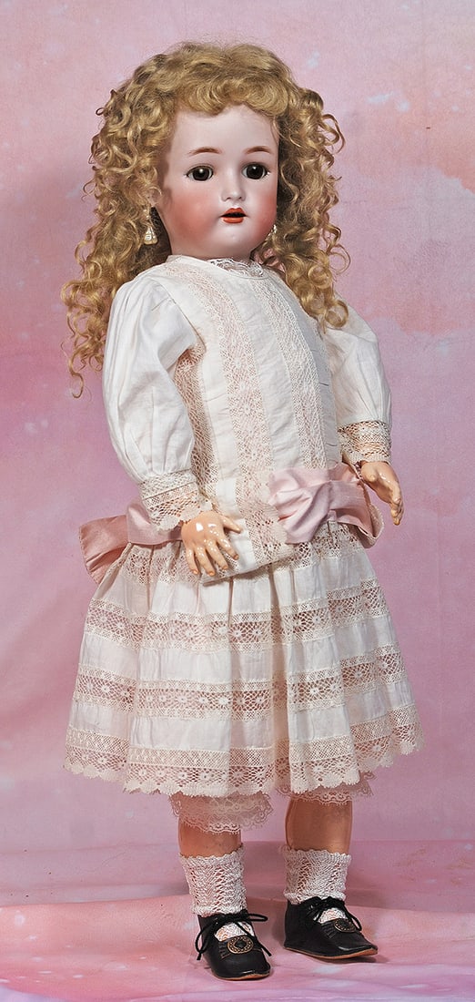 GERMAN BISQUE CHILD BY KAMMER AND REINHARDT. 24”. Marks: K * R./ Simon & Halbig. Bisque: GERMAN BISQUE CHILD BY KAMMER AND REINHARDT. 24”. Marks: K * R./ Simon & Halbig. Bisque socket head, brown sleep eyes, painted and applied lashes, feathered brows, pierced ears, open mouth, acce