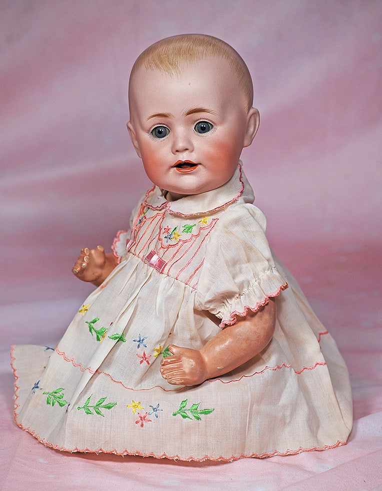 GERMAN BISQUE J.D.K. BABY BY KESTNER.: GERMAN BISQUE J.D.K. BABY BY KESTNER. 17”. Marks: Made in Germany 12. Solid-dome bisque socket head, painted baby hair, blue sleep eyes, painted lashes, feathered brows, open mouth, accented lip