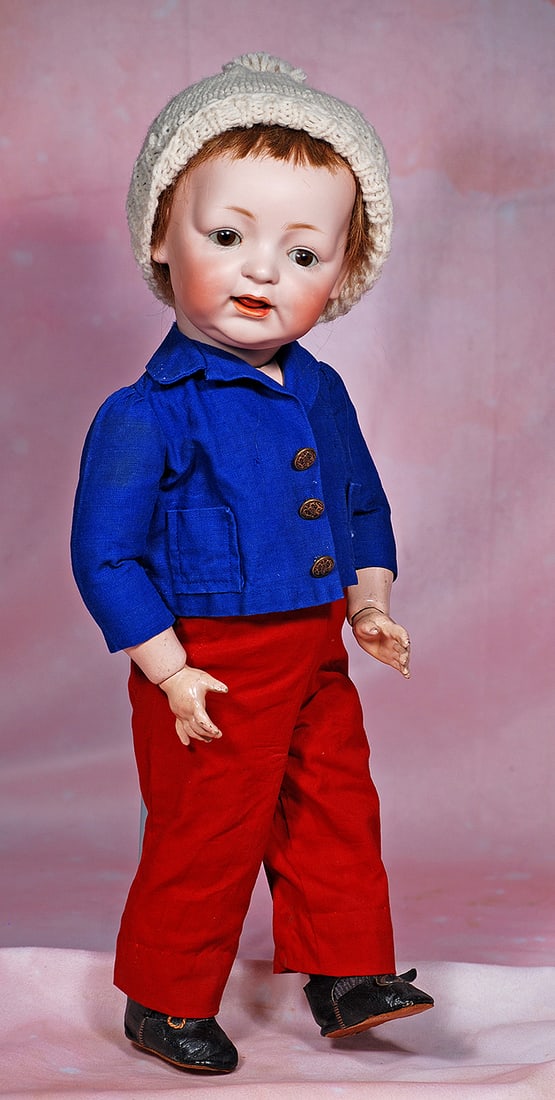 GERMAN BISQUE CHARACTER BY KESTNER WITH TODDLER BODY. (1 of 2)