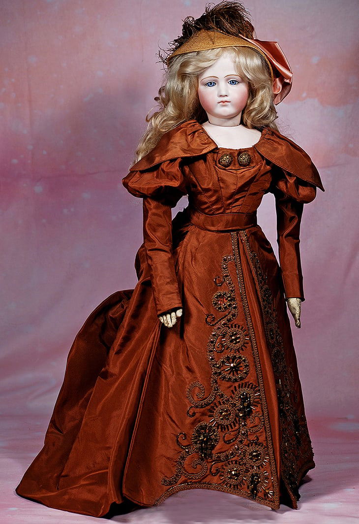 FRENCH BISQUE PORTRAIT FACE POUPEE BY PIERRE-FRANCOIS JUMEAU.: FRENCH BISQUE PORTRAIT FACE POUPEE BY PIERRE-FRANCOIS JUMEAU. 23”. Marks: None. Bisque swivel head on bisque shoulderplate, blue paperweight eyes, painted lashes, eyeliner, mauve-blushed eye sha