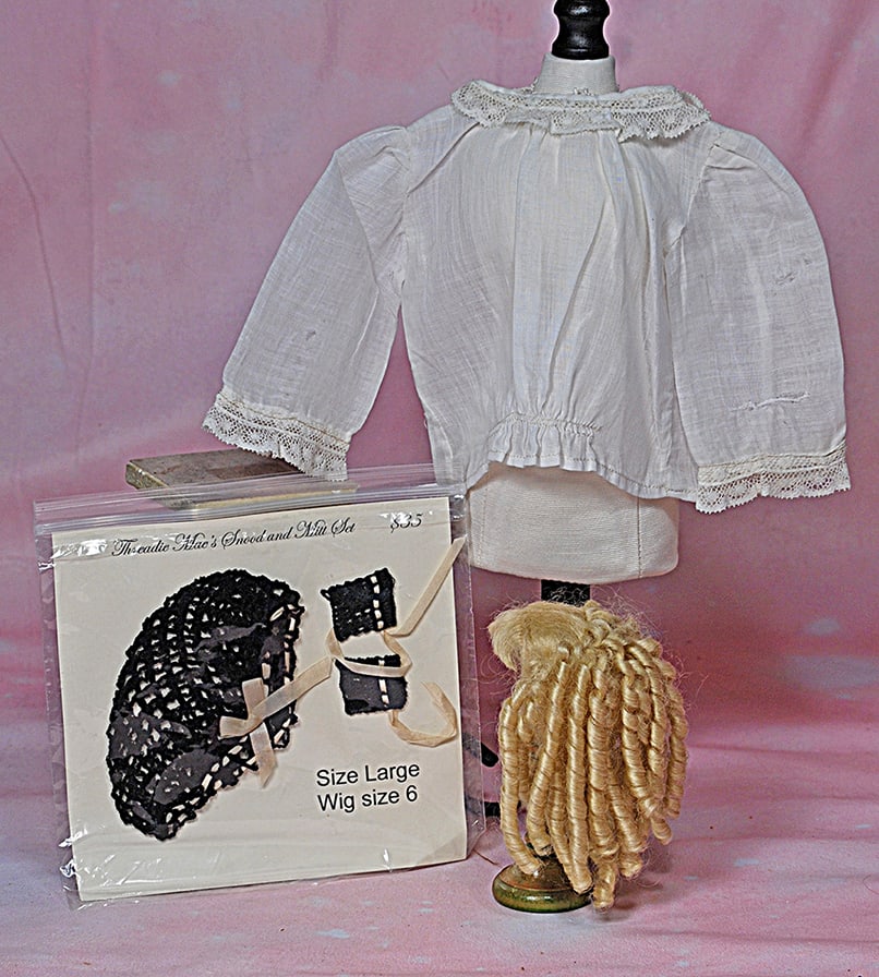 DOLL BODICE, WIG AND SNOOD SET. Antique fine white cotton bodice, 5” shoulder width, 5 ½: DOLL BODICE, WIG AND SNOOD SET. Antique fine white cotton bodice, 5” shoulder width, 5 ½” length; artist-made hand tied light blonde mohair wig for about 6” head circumference; 