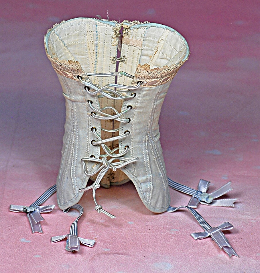 DOLL CORSET.  Pale blue cotton doll corset with front lacing  and back hook-eye closing.  5” (1 of 1)