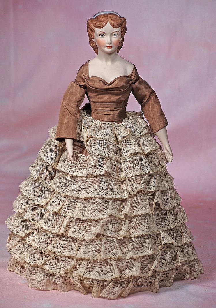 BISQUE ARTIST DOLL BY FAWN ZELLER.: BISQUE ARTIST DOLL BY FAWN ZELLER. 16”. Marks: Miami Miss, Fawn Zeller 1961. Bisque shoulderhead, sculpted brown hair, painted features, cloth body with bisque lower limbs, brown taffeta and lac