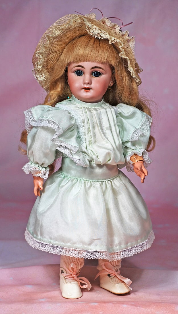 FRENCH BISQUE DEP BEBE.: FRENCH BISQUE DEP BEBE. 14”. Marks: DEP 4. Bisque socket head, blue sleep eyes, painted lashes, eyeliner, feathered brows, pierced ears, open mouth, accented lips, upper teeth,blonde human hair