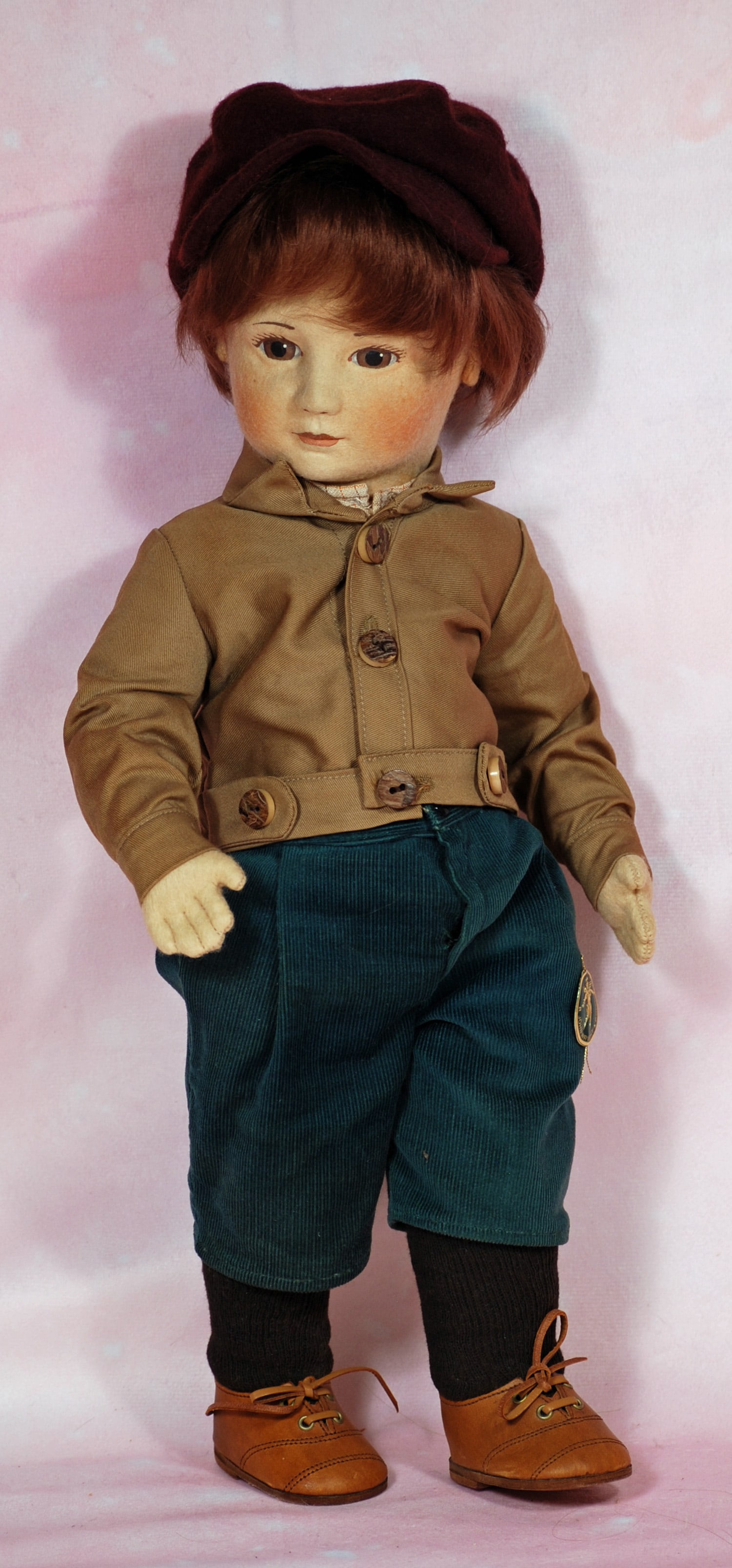 R. JOHN WRIGHT ‘JESSIE’ FROM THE LITTLE CHILDREN SERIES 1.: R. JOHN WRIGHT ‘JESSIE’ FROM THE LITTLE CHILDREN SERIES 1. 17". All-felt doll with swivel head, hand painted facial features, brown eyes, brunette side-parted mohair wig, jointing at shoulders and
