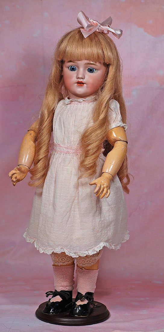 GERMAN BISQUE DOLL, MODEL 1248, BY SIMON AND HALBIG.: GERMAN BISQUE DOLL, MODEL 1248, BY SIMON AND HALBIG. 20”. Marks: Dep S & H 1248. Bisque socket head, blue sleep eyes, painted lashes, eyeliner, feathered brows, pierced ears, open mouth, accente