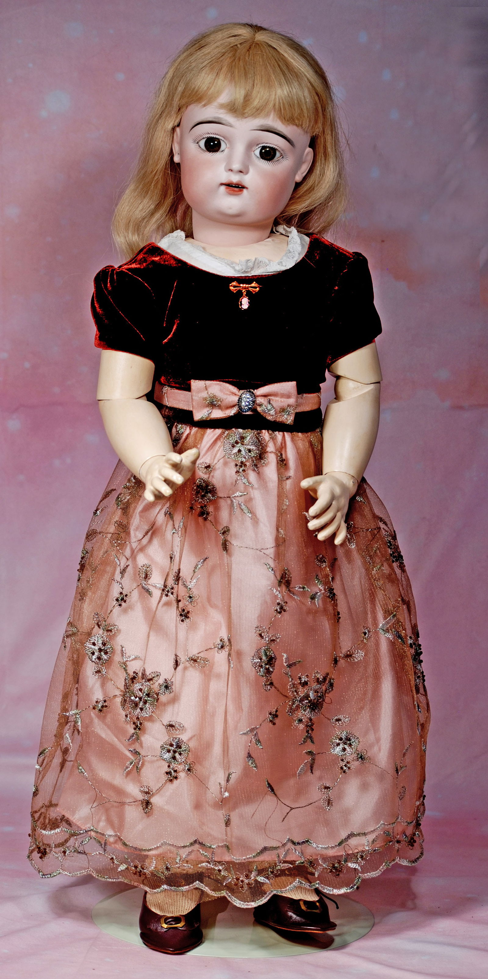 LARGE FRENCH BISQUE BEBE BY GAULTHIER.: LARGE FRENCH BISQUE BEBE BY GAULTHIER. 30”. Marks: F. G. (scroll) 11. Bisque socket head, large brown paperweight eyes, painted lashes, eyeliner, feathered brows, pierced ears, open mouth, shade