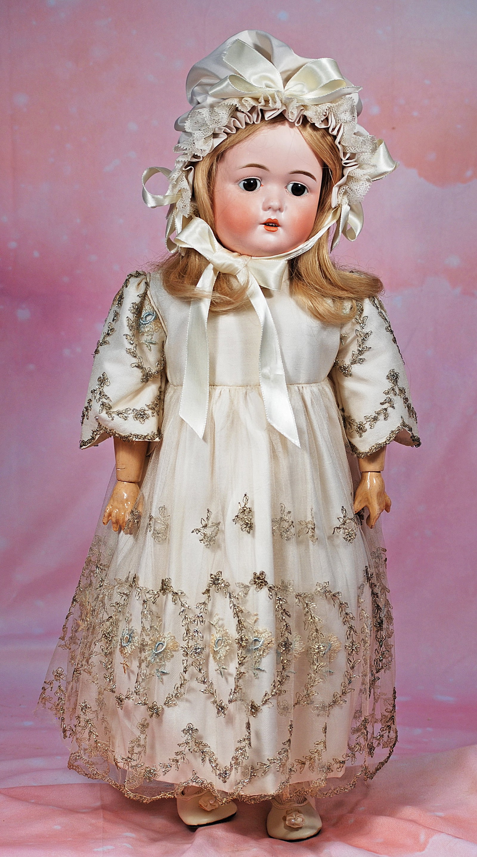 GERMAN BISQUE DOLL BY MYSTERY MAKER: 2. GERMAN BISQUE DOLL BY MYSTERY MAKER. 24”. Marks: D A 6. Bisque socket head, stationary brown glass eyes, painted lashes, feathered brows, open mouth, upper teeth, blonde human hair wig, compo