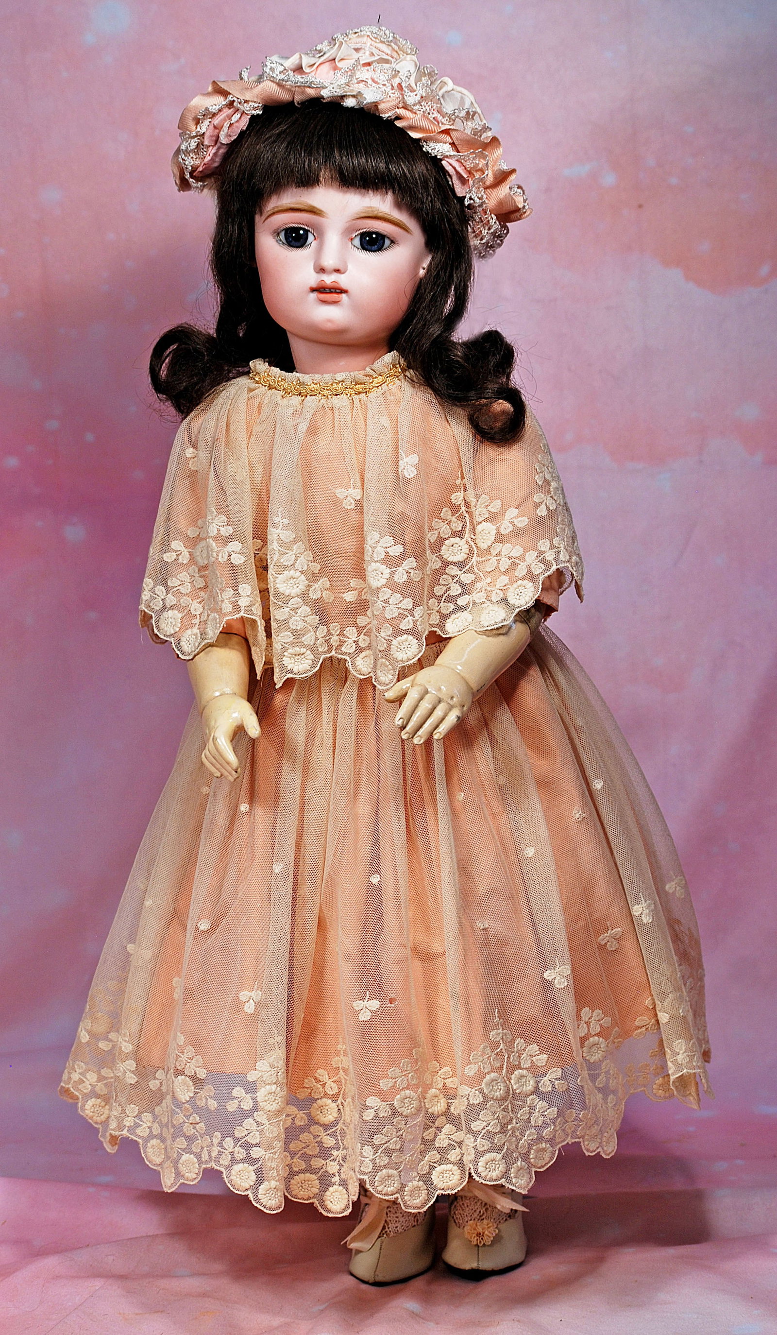 FRENCH BISQUE BEBE BY GAULTHIER WITH ORIGINAL GESLAND BODY.: 16. FRENCH BISQUE BEBE BY GAULTHIER WITH ORIGINAL GESLAND BODY. 25”. Marks: 9 F. G. in scroll. Bisque swivel head on composition shoulderplate, Gesland padded stockinette body over metal armatur