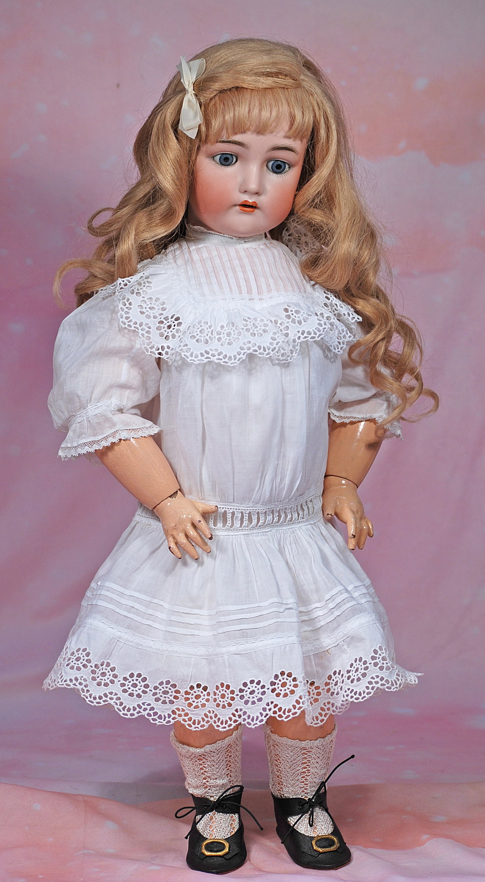 GERMAN BISQUE CHILD BY KAMMER AND REINHARDT.: 23. GERMAN BISQUE CHILD BY KAMMER AND REINHARDT. 24”. Marks: Simon & Halbig, K * R. Bisque socket head, blue sleep eyes, painted lashes, feathered brows, open mouth, accented lips, upper teeth, 