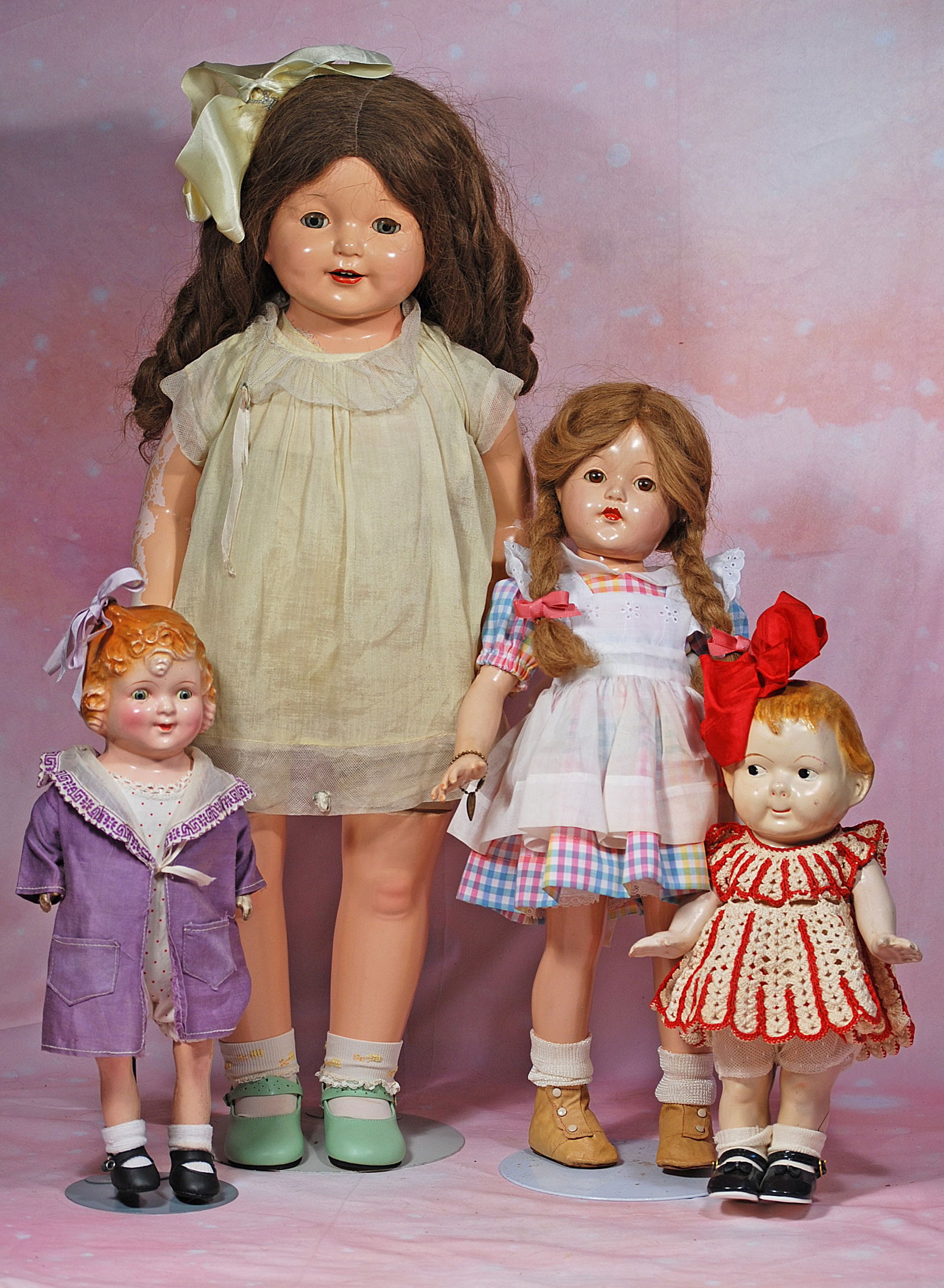 FOUR AMERICAN COMPOSITION DOLLS. (1 of 1)