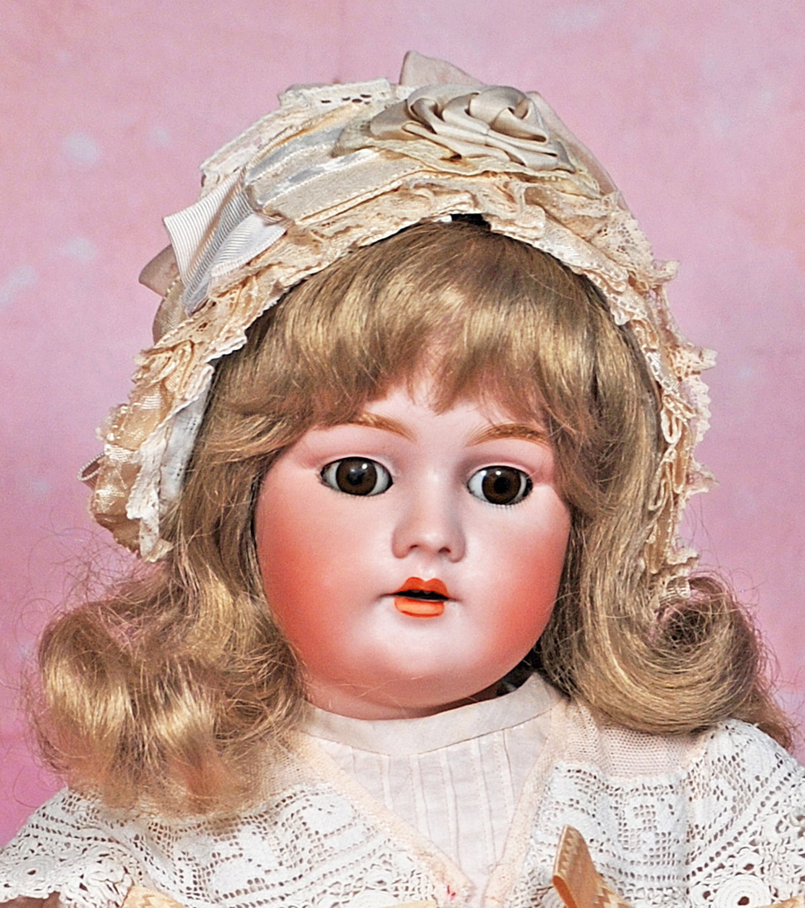 GERMAN BISQUE DOLL BY HANDWERCK: 64. GERMAN BISQUE DOLL BY HANDWERCK. 22”. Marks: Dep 99 Handwerck. Bisque socket head, brown sleep eyes, painted lower lashes, feathered brows, open mouth, accented lips, upper teeth, pierced ea