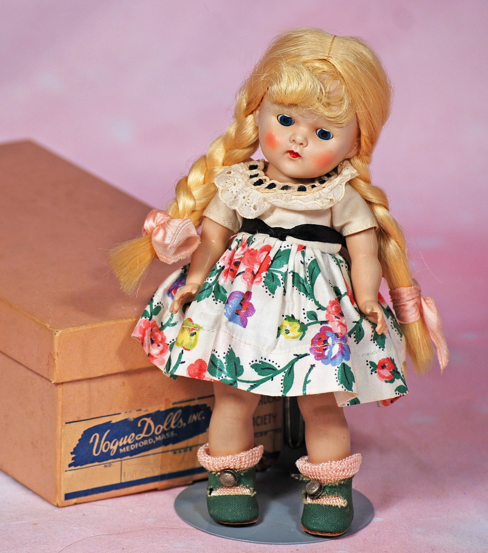 PAINTED-LASH VOGUE GINNY AS LINDA FROM KINDERGARTEN SERIES: 73. PAINTED-LASH VOGUE GINNY AS LINDA FROM KINDERGARTEN SERIES. 8”. Hard plastic, sleep eyes, painted lashes, original blonde wig, tagged cotton print dress and panty, green center-snap shoes, p