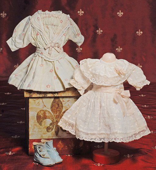 PAIR OF ANTIQUE BLUE LEATHER DOLL BOOTS. Marks: 3.: PAIR OF ANTIQUE BLUE LEATHER DOLL BOOTS. Marks: 3. 2 ¼” L. pale blue leather boots with three button side closing, cotton lining, leather soles. Commentary: Very good condition.