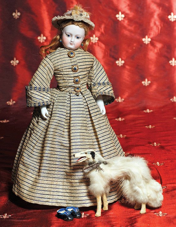 FRENCH SALON DOG FOR POUPEE. 5” H. Papier mache w: FRENCH SALON DOG FOR POUPEE. 5” H. Papier mache with lavish white fur covering, felt legs, open mouth, amber glass eyes, black metallic neck bow. Commentary: Late 19th century accessory item for pou