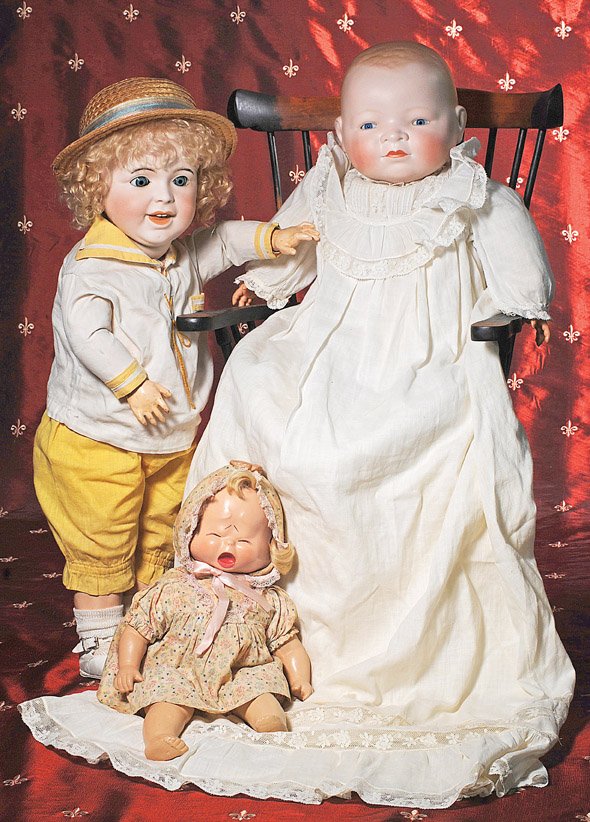 LIFE-SIZE BISQUE “BYE-LO” BABY. Marks: Copr. By : LIFE-SIZE BISQUE “BYE-LO” BABY. Marks: Copr. By Grace S. Putnam,Germany. 17” head circumference; 22” H. Solid dome bisque swivel head, molded and painted light brown curly hair, stationary blu